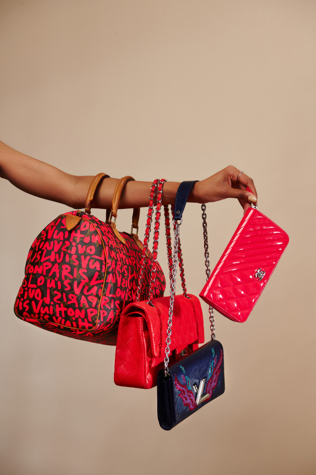 a collection of designer luxury handbags
