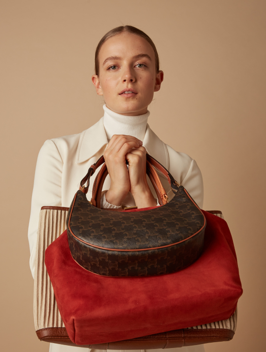 Woman with top designer handbag styles